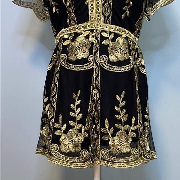 Elegant Black and Gold Romper with Modern Flair Size Medium - Picture 4 of 12